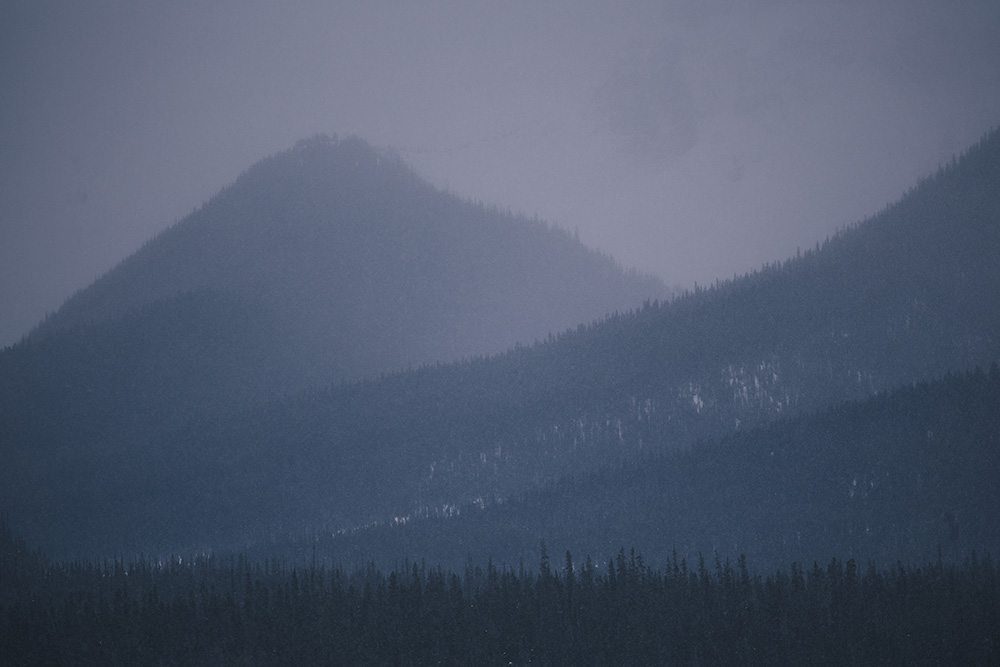 Rocky mountains in fog Jasper Alberta